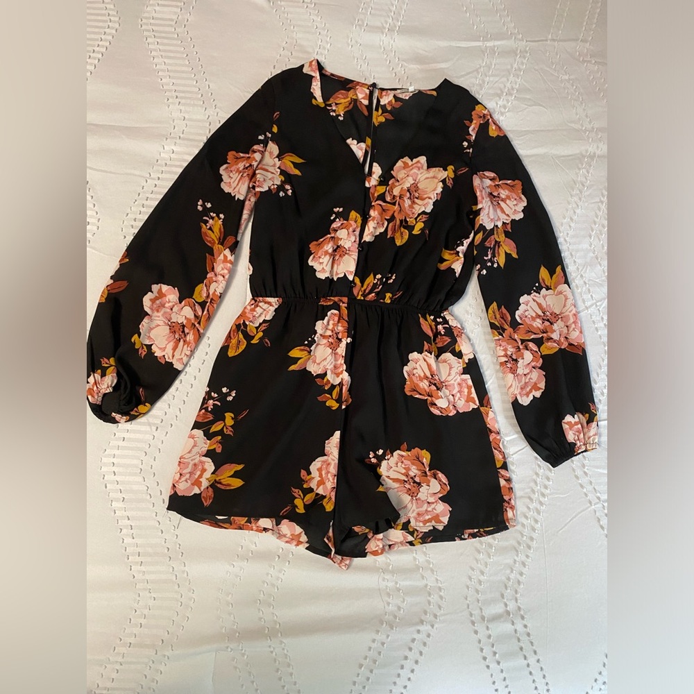 Black long sleeve romper with flower print